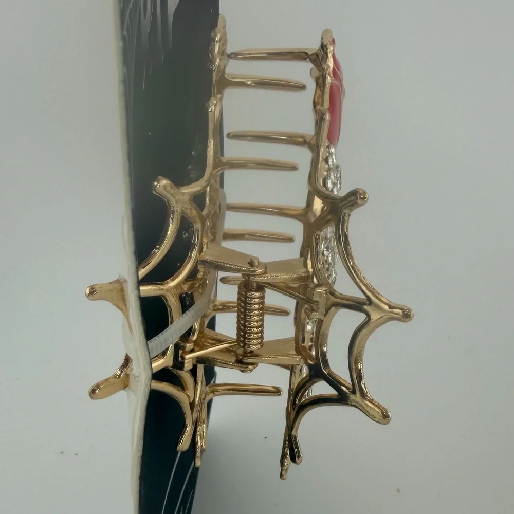 Nicole Miller Gold-Tone Crystal Skull Hair Claw Clip with Red Rose and Web